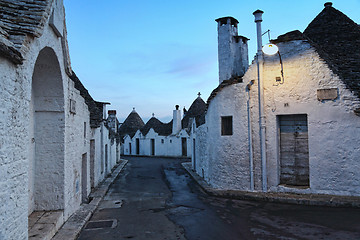 Image showing night view of trulli