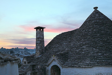 Image showing trulli at sunset