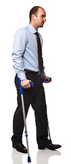 Image showing man with crutch