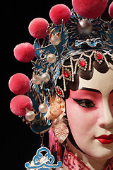 Image showing chinese opera dummy and black cloth as text space 