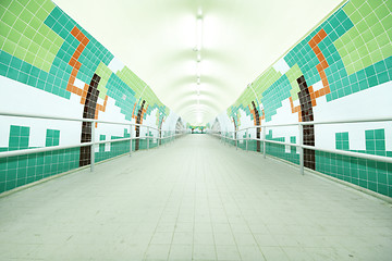 Image showing long tunnel with lamps and nobody walking 