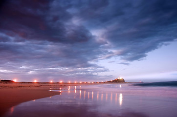 Image showing lighthouse and breakwater at night