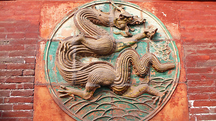 Image showing Ancient carvings of dragon