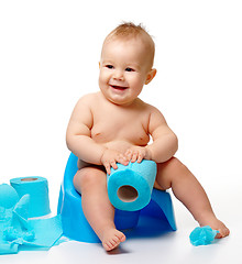 Image showing Child on potty