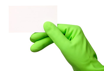 Image showing Hand in green glove showing business card