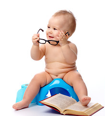 Image showing Child on potty