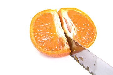 Image showing Mandarin orange cut with a knife