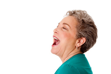 Image showing Happy senior woman talking screaming yelling singing