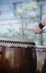 Image showing hands and japanese drums
