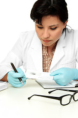 Image showing Scientist holding a fingerprint sample