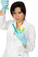 Image showing Scientist, pipette and test tubes