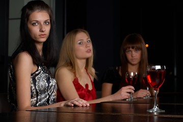 Image showing Young women in a bar
