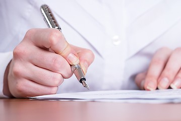 Image showing Writing girl