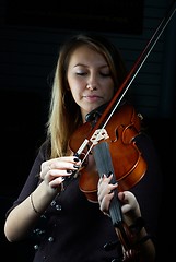 Image showing Woman and violin