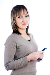 Image showing Girl writing sms