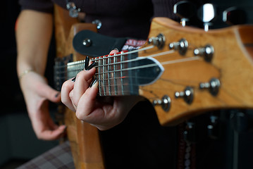 Image showing Playing on guitar