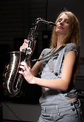 Image showing Woman with saxophone