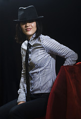 Image showing Woman with tie and hat