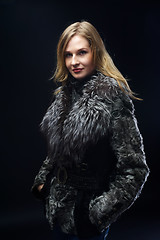 Image showing Attractive woman in fur coat