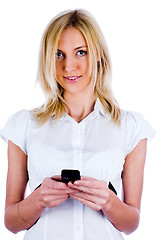 Image showing Girl writing sms