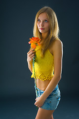 Image showing Pretty girl with flower