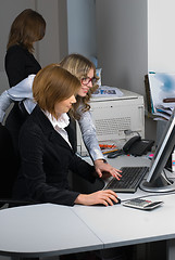 Image showing Businesswoman and computer