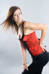 Image showing Young woman in corset