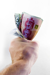 Image showing Fist full of Canadian Money