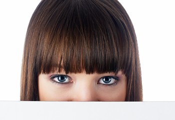 Image showing Girl behind white board