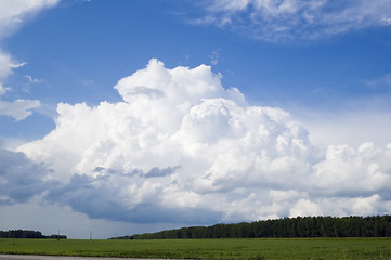 Image showing Cloudscape over forest