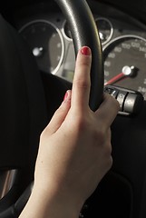 Image showing Young woman in car