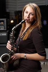 Image showing Woman with saxophone