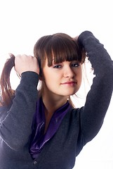 Image showing Woman with hands in hair