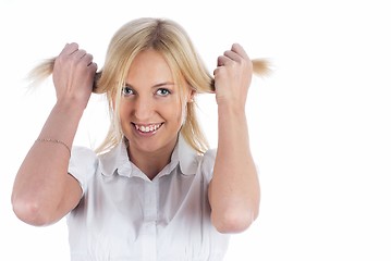 Image showing Woman with hands in hair