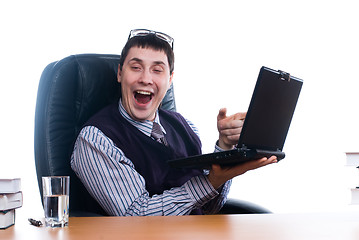 Image showing Young businessman with laptop