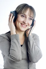 Image showing Woman listening music