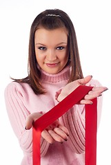 Image showing Woman with red tape