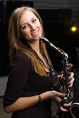 Image showing Woman with saxophone