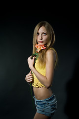 Image showing Pretty girl with flower