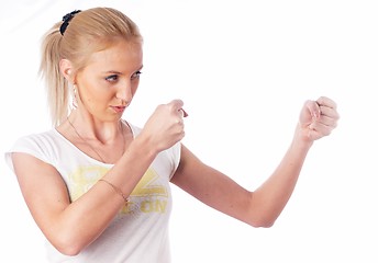 Image showing Woman showing fists