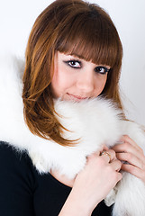 Image showing Girl wearing white fur