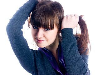 Image showing Woman with hands in hair