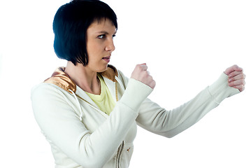 Image showing Girl with fists