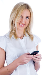 Image showing Girl writing sms