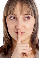 Image showing Woman gesturing to silence
