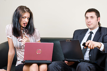 Image showing Businessmen with computers on sofa