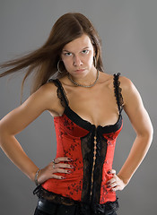 Image showing Young woman in corset