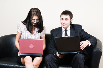 Image showing Businessmen with computers on sofa