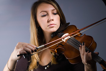 Image showing Woman and violin