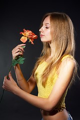 Image showing Pretty girl with flower